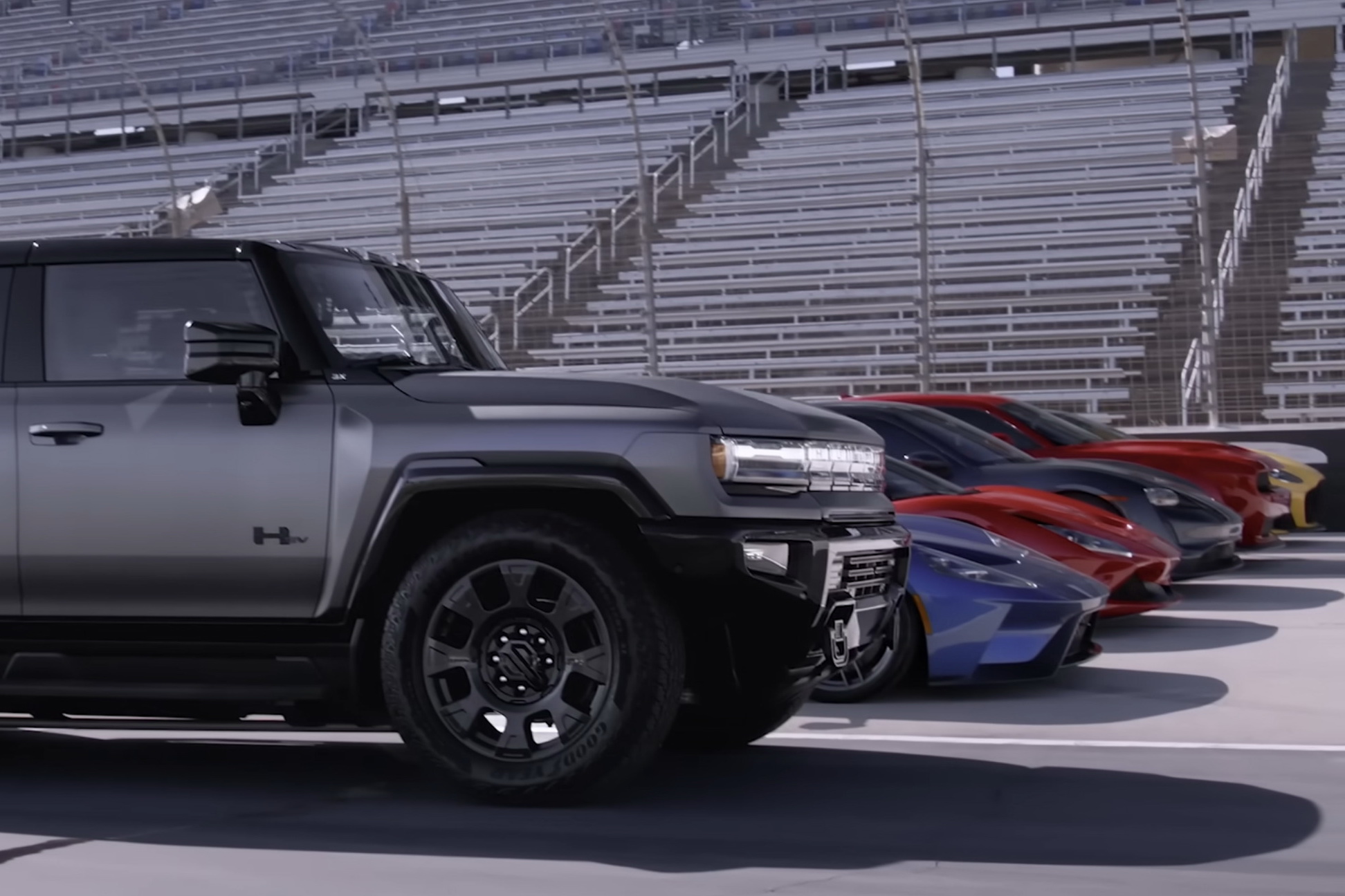 gmc hummer ev vs supercar 1.jpg