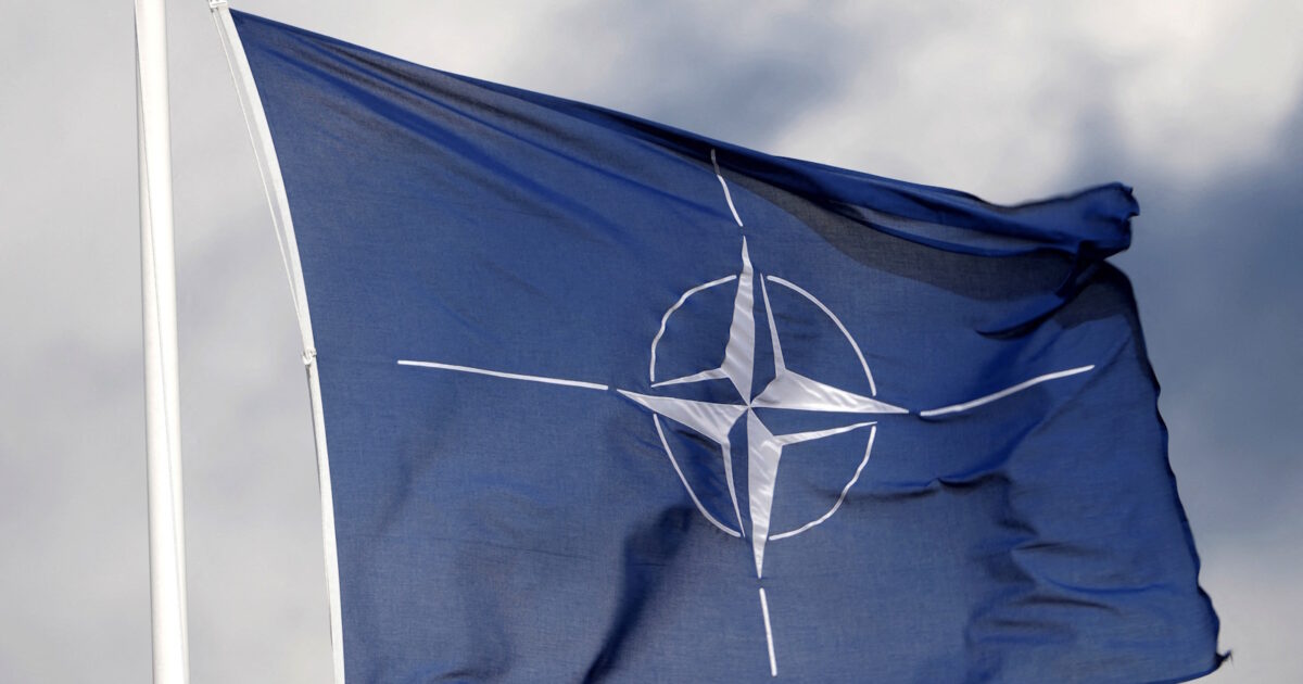 nato flag reuters 1200x630.jpg